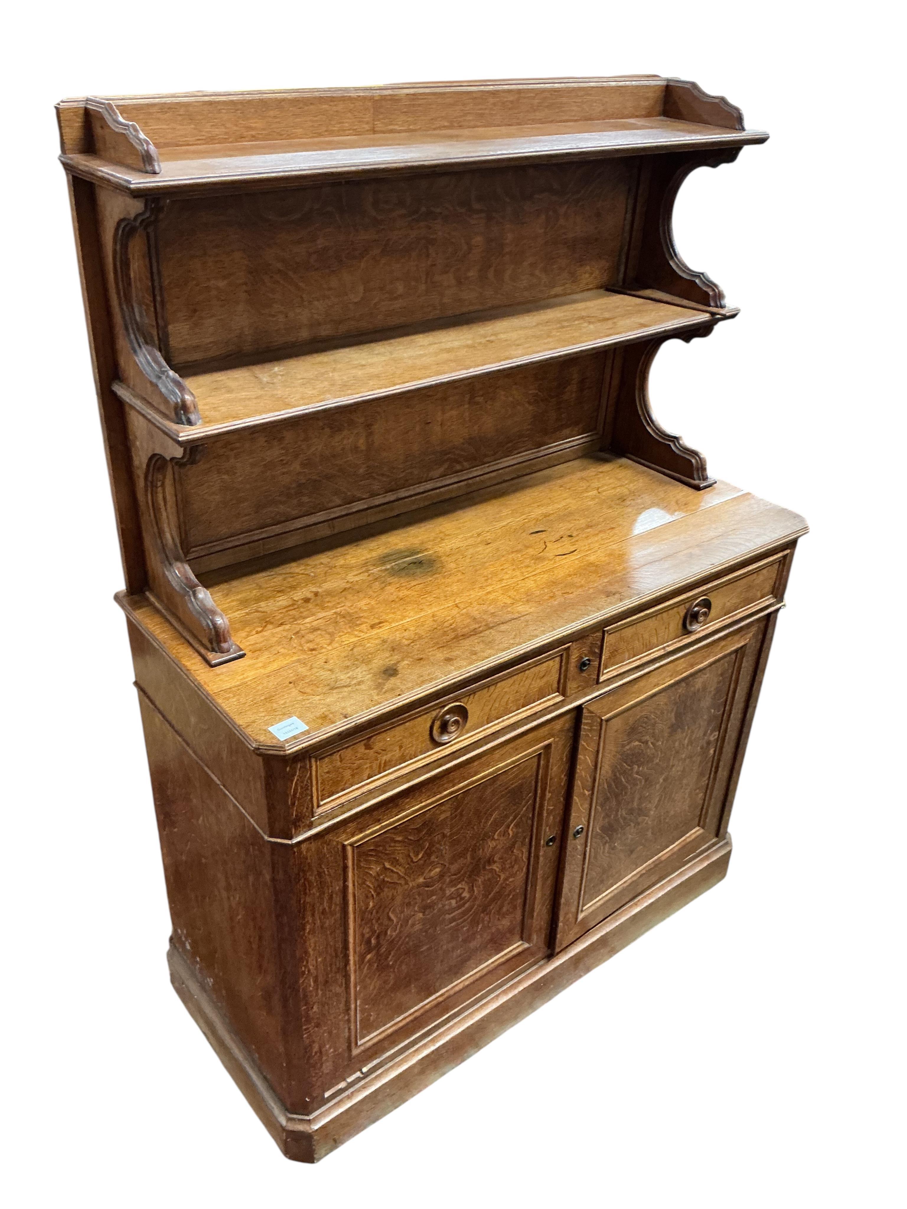 A 19th century French oak chiffonier, width 112cm, depth 47cm, height 157cm